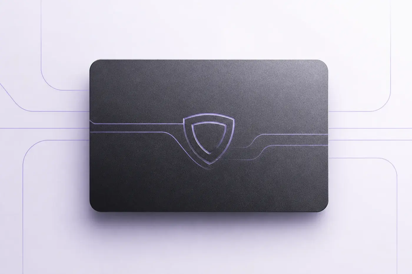A graphite Fiber card protected by a lavender privacy shield as ledger paths disappear behind it